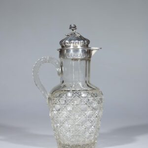 Cut glass decanter with silver mounting