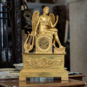 Empire style table clock with Apollo