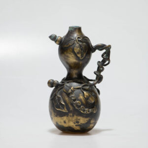 Chinese bronze teapot in the shape of a gourd