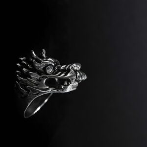 Silver ring with a dragon's head